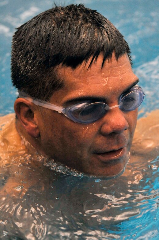 Senior Master Sgt. Martin Smith swims in the Academy indoor pool prior to the start of the 2013 Warrior Games in Colorado Springs, Colo. More than 200 athletes from all services are competing from May 11 through May 16, 2013. (U.S. Air Force photo/Desiree N. Palacios) 

 