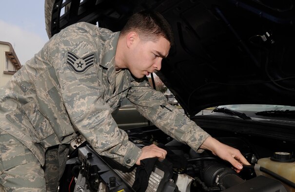 Staff Sgt. Chris Segler, 35th Logistics Readiness Squadron vehicle maintainer, inspects a vehicle for any damage at Misawa Air Base, Japan, April 30, 2013. The 35 LRS recently completed the Logistics Compliance Assessment Program that evaluates their daily work. After two years of preparation, the squadron received an excellent rating validating their hard work. (U.S. Air Force photo by Airman 1st Class Kaleb Snay)