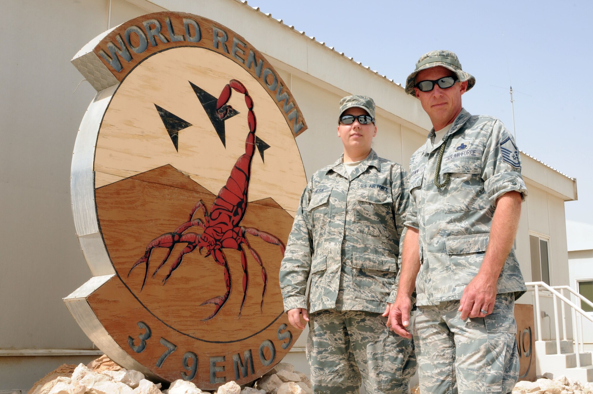 Master Sgts. Martin Brown and Renee Hess are unit deployment managers for the 379th Expeditionary Maintenance Group, helping to move maintenance specialists into and out of the U.S. Central Command theater of operations. Hess, from Shaw Air Force Base, S.C., and Brown, from Davis-Monthan AFB, Ariz., have helped deploy into and out of theater hundreds of maintenance troops. (U.S. Air Force photo/Master Sgt. Christian Michael)