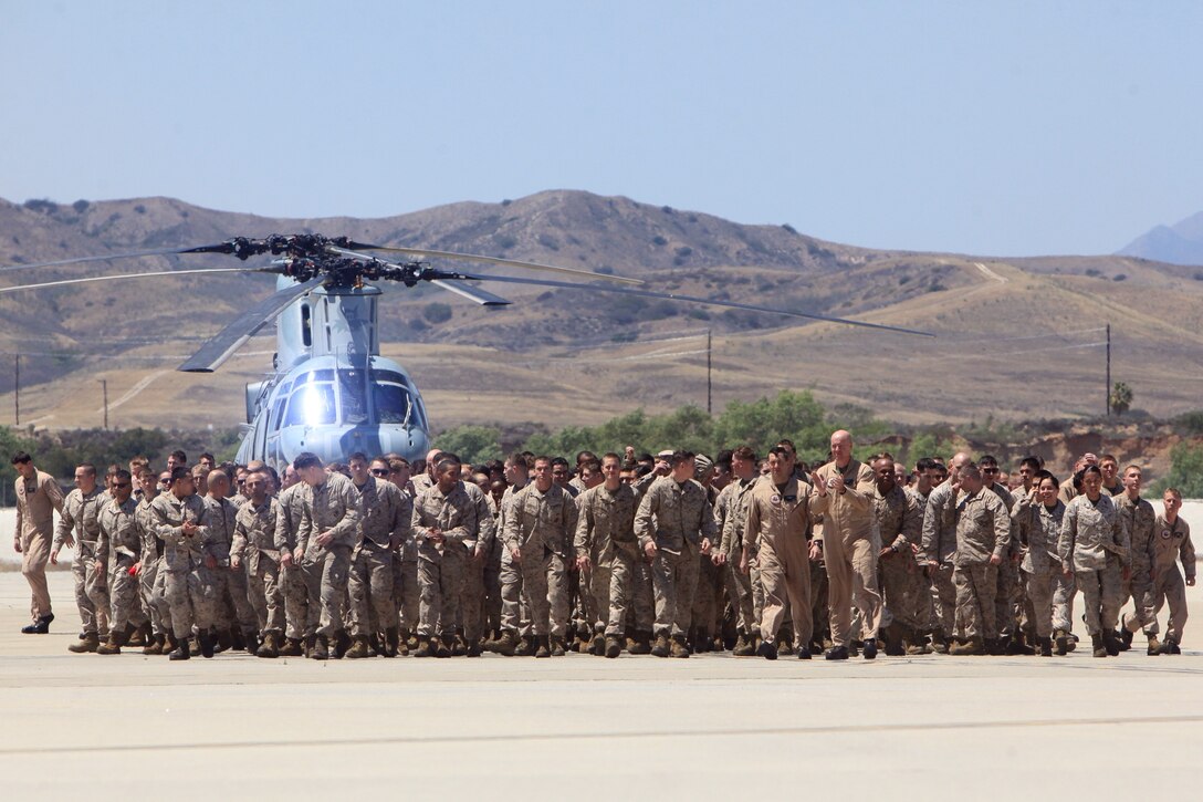 Marines with Marine Medium Helicopter Squadron 364 (Reinforced), the aviation combat element for the 15th Marine Expeditionary Unit, break after formation and make their way to their loved ones during their homecoming at Camp Pendleton, May 13.