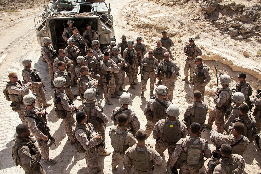 Staff Sgt. Tom Painter, from Roanoke, Va., and section leader, Amphibious Assault Vehicle (AAV) Platoon and Staff Sgt. Andrew Ethridge, platoon sergeant, 2nd Platoon, Company K, Battalion Landing Team 3/2, 26th Marine Expeditionary Unit (MEU), debrief their platoons on their execution of a personnel and vehicle casualty drill during an exercise in the 5th Fleet area of responsibility April 23, 2013. The 26th Marine Expeditionary Unit is currently deployed as part of the Kearsarge Amphibious Ready Group to the 5th Fleet area of responsibility. The 26th MEU operates continuously across the globe, providing the president and unified combatant commanders with a forward-deployed, sea-based quick reaction force. The MEU is a Marine Air-Ground Task Force capable of conducting amphibious operations, crisis response, and limited contingency operations.
(U.S. Marine Corps photo by Staff Sgt. Edward Guevara/Released)