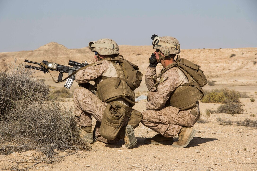 2nd Lt. Phillip Richard, right, platoon commander from Charlotte, N.C., acts as range safety officer for Lance Cpl. Colby Carter, automatic rifleman from Hudson, N.H., both assigned to 2nd Platoon, India Company, Battalion Landing Team 3/2, 26th Marine Expeditionary Unit (MEU) as he participates in a fire team range during an exercise in the 5th Fleet area of responsibility, April 24, 2013. The 26th MEU is currently deployed as part of the Kearsarge Amphibious Ready Group to the 5th Fleet area of responsibility. The 26th MEU operates continuously across the globe, providing the president and unified combatant commanders with a forward-deployed, sea-based quick reaction force. The MEU is a Marine Air-Ground Task Force capable of conducting amphibious operations, crisis response, and limited contingency operations.
(U.S. Marine Corps photo by Cpl. Michael S. Lockett/Released)
