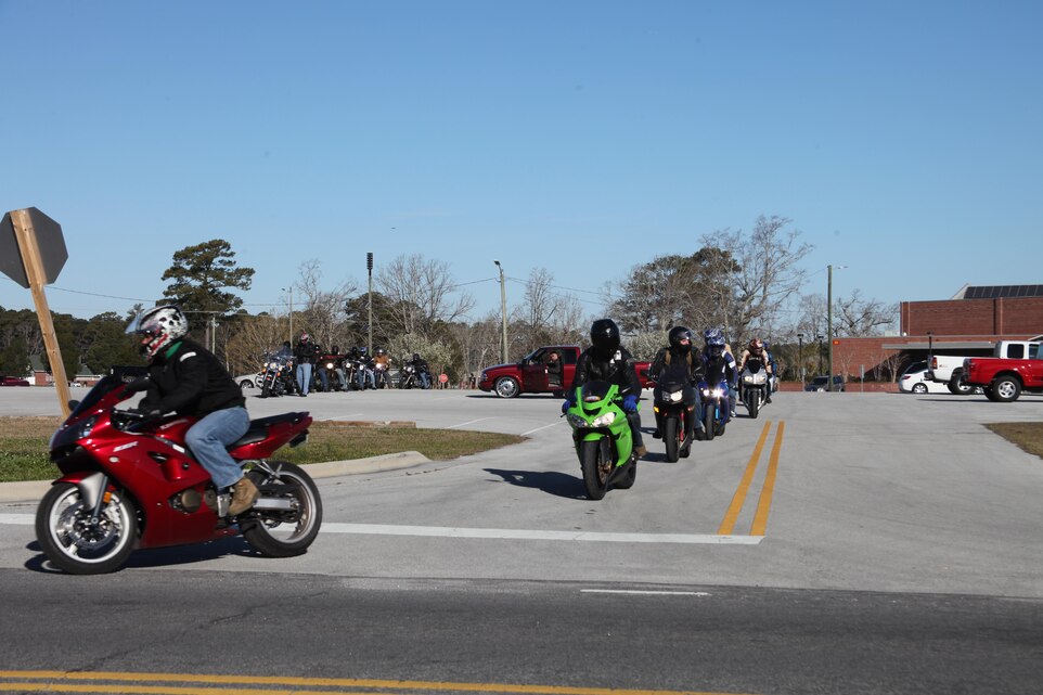 Marine Aviation Logistics Squadron 14 Marines depart from the station theater aboard Cherry Point during the start of the unit’s quarterly motorcycle ride promoting rider safety March 22.