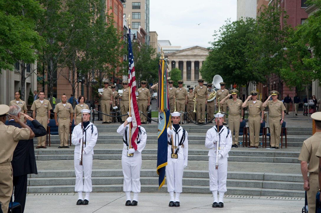 The U.S. Navy Ceremonial Honor Guard present the colors during the 2012 Sailor of the Year Pinning Ceremony. Four sailors from around the fleet were meritoriously promoted to chief petty officer by Vice Chief of Naval Operations Adm. Mark E. Ferguson.