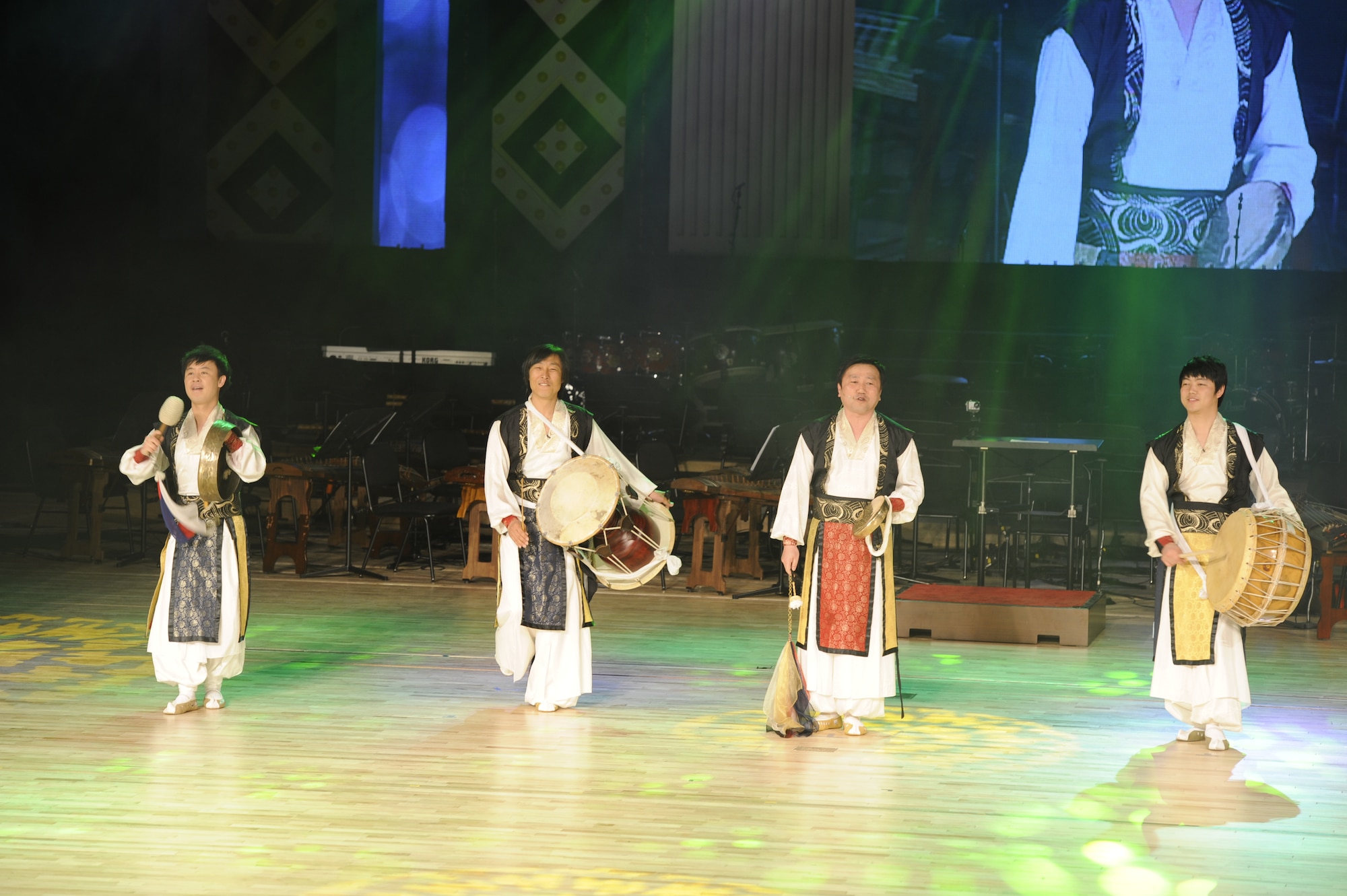 KUNSAN AIR BASE, Republic of Korea – South Korean traditional percussion performer’s play for the audience during the opening of the art center, at Gunsan City, Republic of Korea May 1, 2013.  More than 1,200 South Korean provisional wide government officials, 8th Fighter Wing leadership and Gunsan locals were in attendance to enjoy the special performance. (U.S. Air Force Photo by Staff Sgt. Tong Duong) (U.S. Air Force Photo by Staff Sgt. Tong Duong)