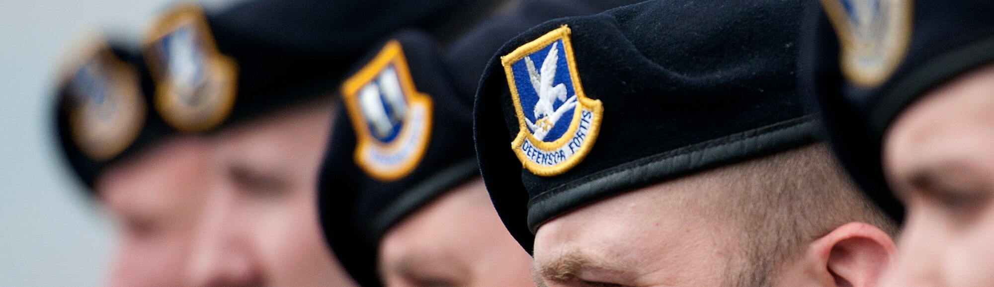 ALTUS AIR FORCE BASE, Okla. – Airmen assigned to the 97th Security Forces Squadron attends the retreat ceremony at Wings of Freedom Park, May 15. In observance of National Police Week and in honor of Peace Officers Memorial Day, which is held annually to recognize law enforces killed or disabled in the line of duty, 97th SFS members performed this ceremony to honor fallen defenders. (U.S. Air Force photo by Senior Airman Jesse Lopez / Released)