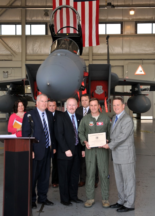 (Westfield, MA) Lt. Governor Timothy P. Murray presents Col. James P. Keefe, Commander of the 104th Fighter Wing, with a citation in recognition for receiving the highest possible assessment by the North American Aerospace Defense Command (NORAD) during a recent unannounced inspection, May 16, 2013. Murray and members of the Military Asset and Security Strategy Task Force, which Murray leads, work closely with Massachusetts military leaders to enhance and improve the Commonwealth’s military infrastructure.  The task force met to discuss initiatives designed to enhance the relevancy of the two units located at Barnes Municipal Airport.  (U.S. Air National Guard photo by Senior Master Sgt. Robert J. Sabonis/Released).