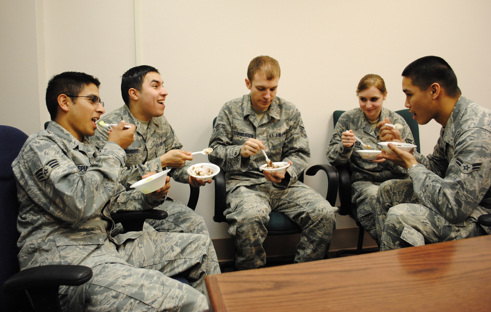 Medical technicians from the 319th Medical Operation Squadron kick back and enjoy a few laughs and desert during an ice cream social May 7, 2013, on Grand Forks Air Force Base, N.D. The social was one of five events designed to show appreciation for nurses and medical technicians during this year’s Nurse-Tech Week. (U.S. Air Force photo/Staff Sgt. Luis Loza Gutierrez)
