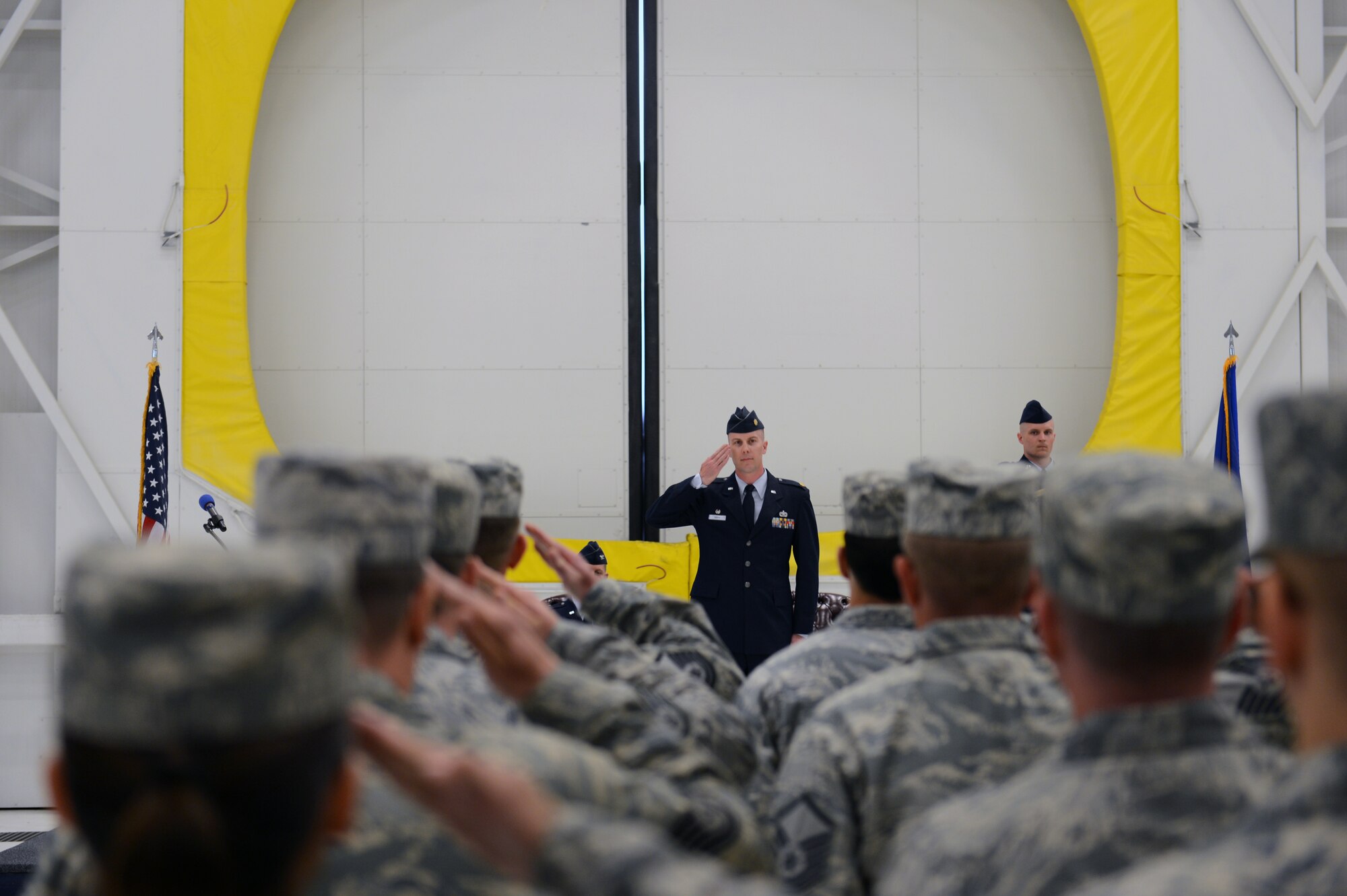 Maj. Clinton Varty, outgoing 62nd Maintenance Operations Squadron commander, renders the final salute to his squadron members prior to the 62nd MOS deactivation May 13, 2013 at Joint Base Lewis-McChord, Wash. Varty is slated to become the 62nd Maintenance Squadron commander. (U.S. Air Force photo/Staff Sgt. Jason Truskowski)