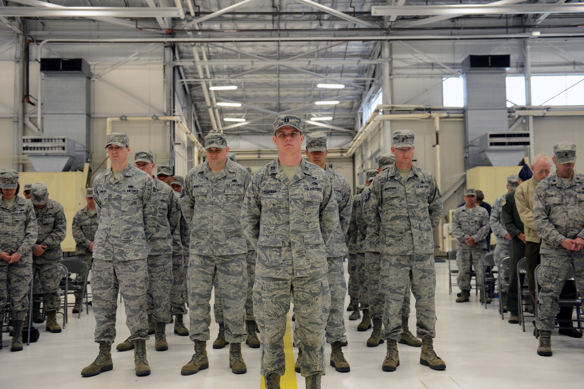 Capt. Benjamin Chapman, 62nd Maintenance Group maintenance operations officer in charge, leads the a formation during the 62nd Maintenance Operations Squadron Deactivation Ceremony May 13, 2013 at Joint Base Lewis-McChord, Wash. The 62nd MOS has a history of notable achievements, including earning the Air Force Meritorious Unit Award for the period Sept. 11, 2001 through Sept. 10, 2003, as well as the Air Force Outstanding Unit Awards eight times since 1996. (U.S. Air Force photo/Staff Sgt. Jason Truskowski)