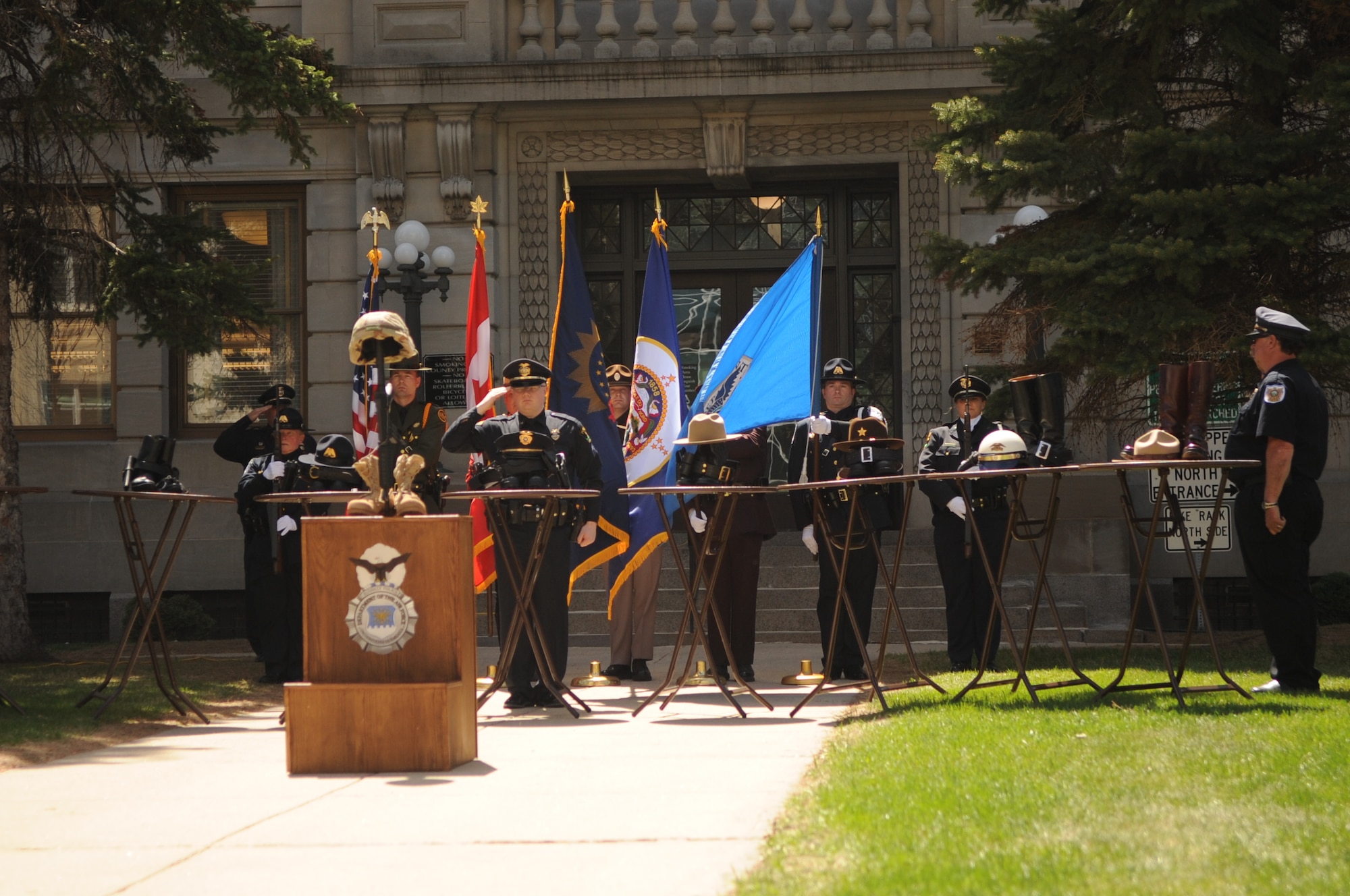 The joint law enforcement color guard presents the colors during the 3rd Annual Northern Valley Police Week kick-off at the Peace Officers’ Memorial Day ceremony at the courthouse in Grand Forks, N.D., May 14, 2013. Airmen from the 319th Security Forces Squadron on Grand Forks Air Force Base joined the ceremony. The week of May 15 is designated as Police Week to honor those officers who have lost their lives in the line of duty.  (U.S. Air Force photo/ Staff Sgt. Amanda N. Grabiec)
