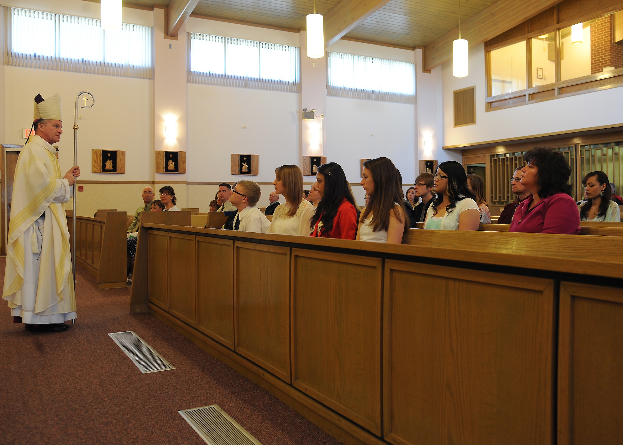 Archbishop Timothy Broglio, Archbishop of Military Services, gives a sermon during Mass about the meaning behind the Sacrament of Confirmation along with accepting responsibility for faith and destiny on May 11, 2013, on Grand Forks Air Force Base, N.D. Broglio visited Grand Forks AFB to bestow the Sacrament of Confirmation upon five young adults. Providing religious services such as this one to Airmen and their families directly supports the Spiritual Fitness Pillar of Comprehensive Airman Fitness, an Air Force-wide resiliency program. (U.S. Air Force photo/Airman 1st Class Xavier Navarro)