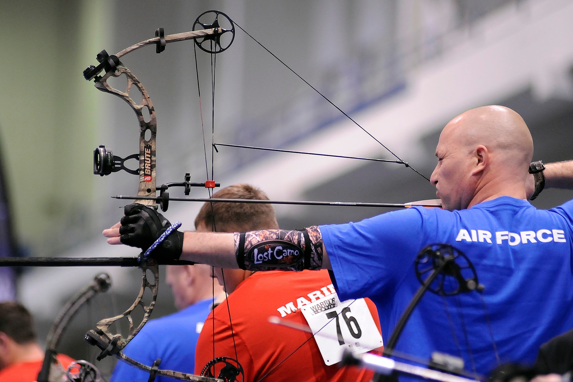 Retired Tech. Sgt. Corey Carter lines up a shot with a compound bow during the Warrior Games archery competition at the Air Force Academy May 15, 2013. Carter, previously an Air National Guardsman assigned to Rickenbacker Air National Guard Base, Ohio, was injured by a roadside bomb in Balad, Iraq, in September 2004. He placed fourth in the compound open. (U.S. Air Force photo/Sarah Chambers)