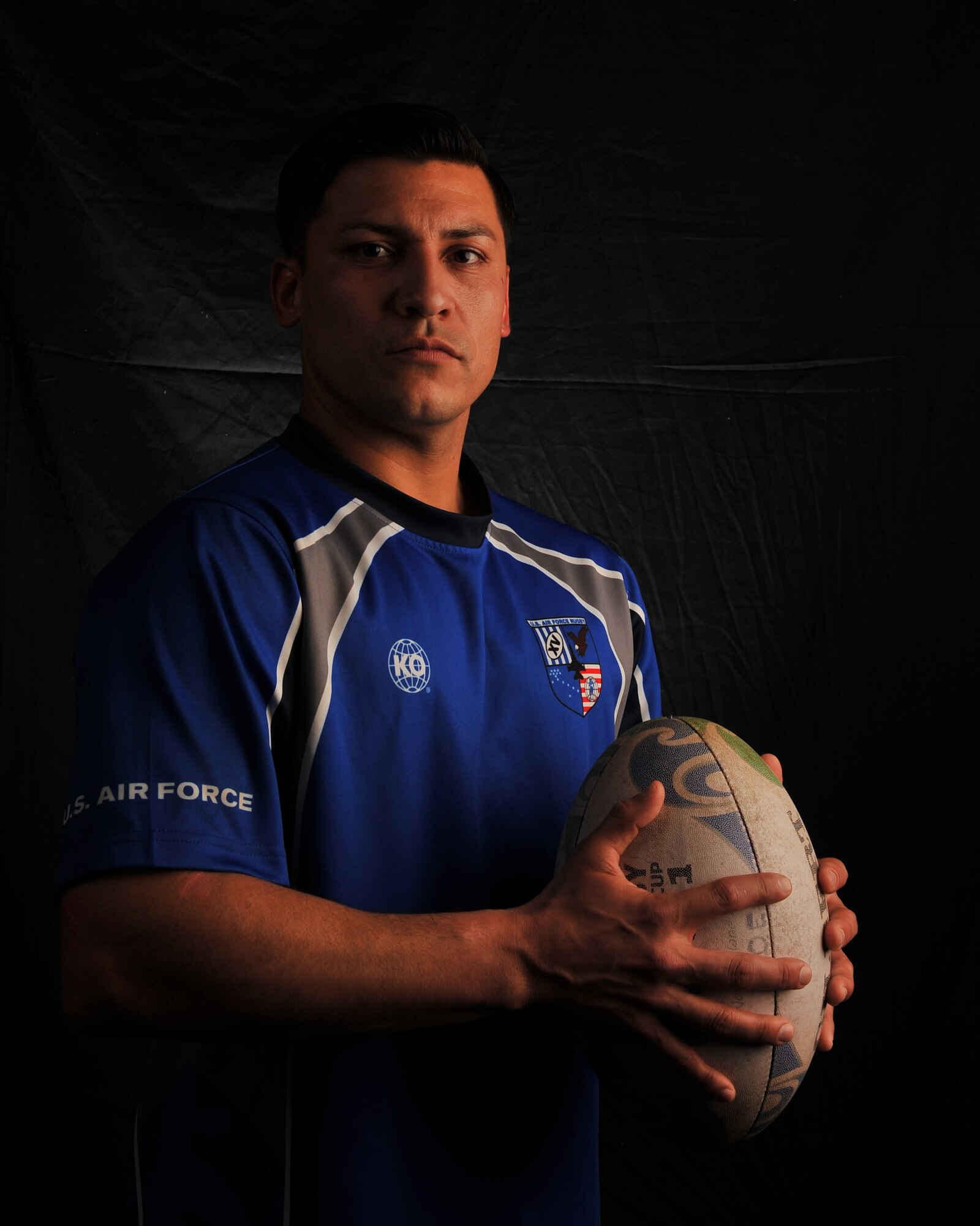 Staff Sgt. Joseph Senteno, 2nd Comptroller Squadron, holds a rugby ball on Barksdale Air Force Base, La., May 10, 2013. Senteno was chosen to represent the Air Force in rugby at the Military Memorial Cup, which is a sports competition where the best athletes from each branch compete. During the competition, Senteno will be given the opportunity to compete for a position on the U.S. Olympic team. (U.S. Air Force photo/Airman 1st Class Benjamin Gonsier)
