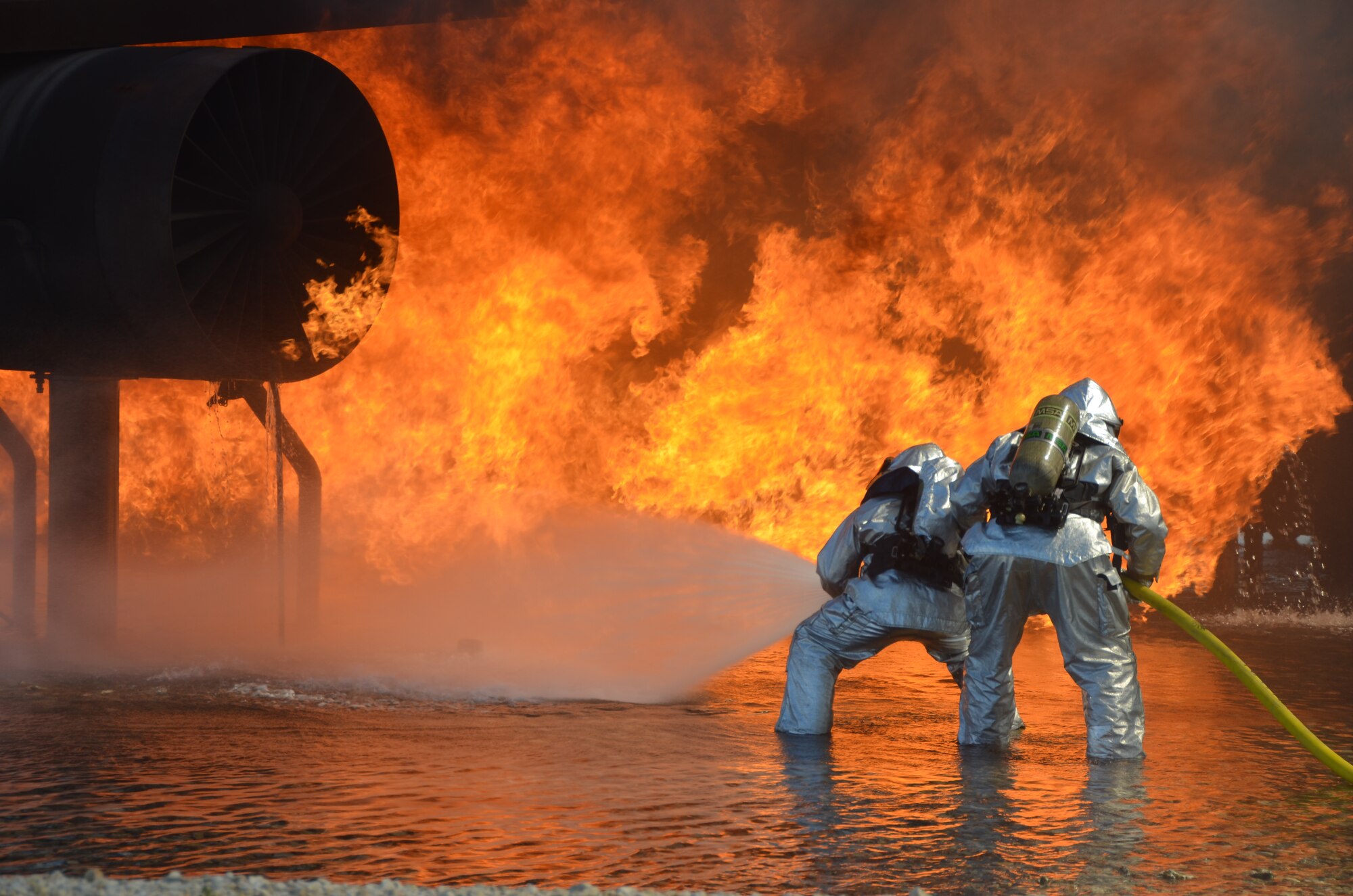 Using computer-controlled fuel (propane) simulates realistic firefighting situations. (U.S. Air Force photo by Minnie Jones)