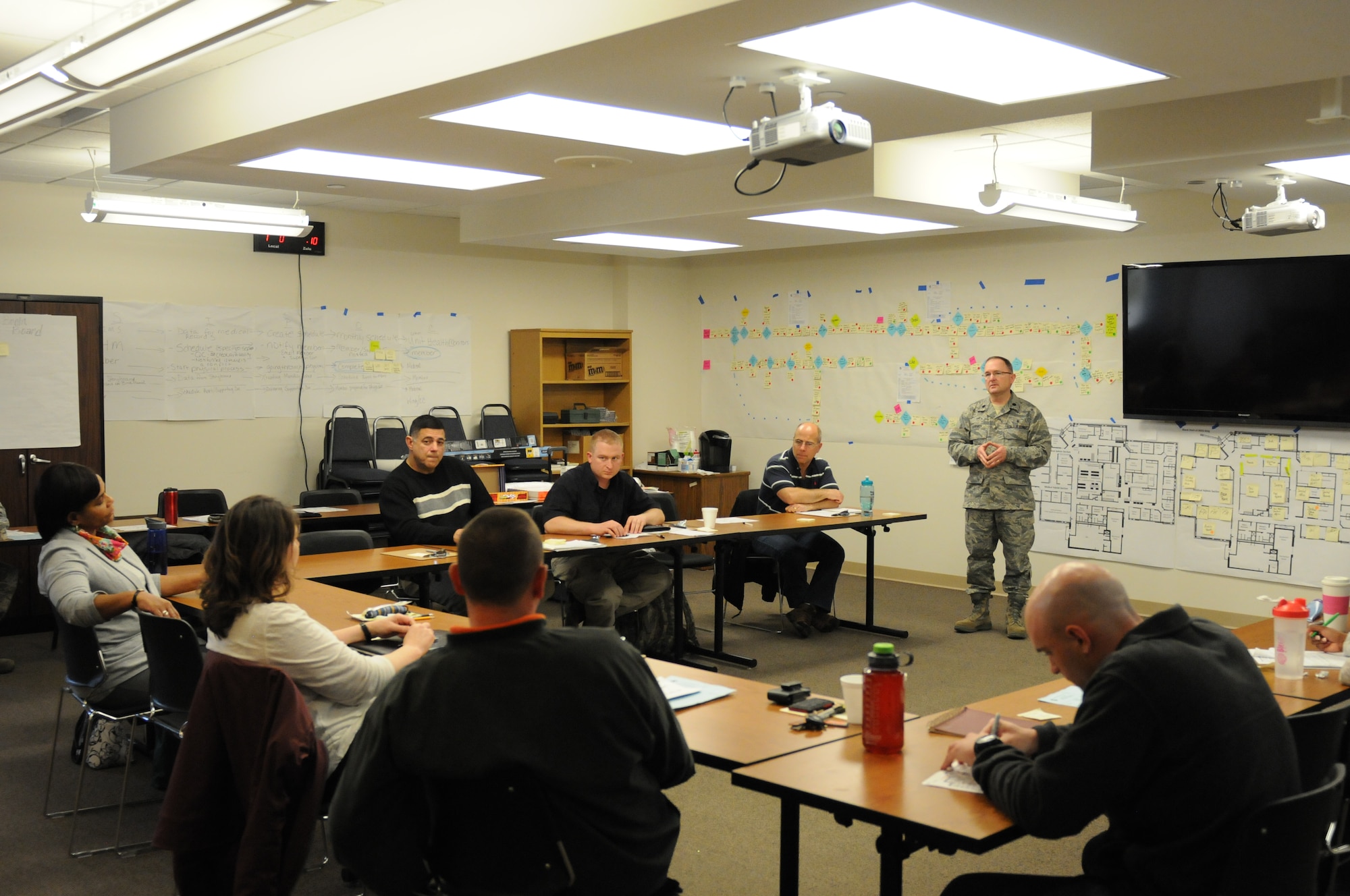 New York Air National Guard Lt. Col. Gilbert Harvey, MSC, 174th Attack Wing (ATKW) Health Administrator, leads a discussion during a Continuous Process Improvement (CPI) event hosted at Hancock Field Air National Guard Base, Syracuse, New York during the week of April 15, 2013.  The CPI will help streamline processing of military personnel in the 174th ATKW Medical Group. (Photo by NYANG Lt. Col. Catherine Hutson/Released).