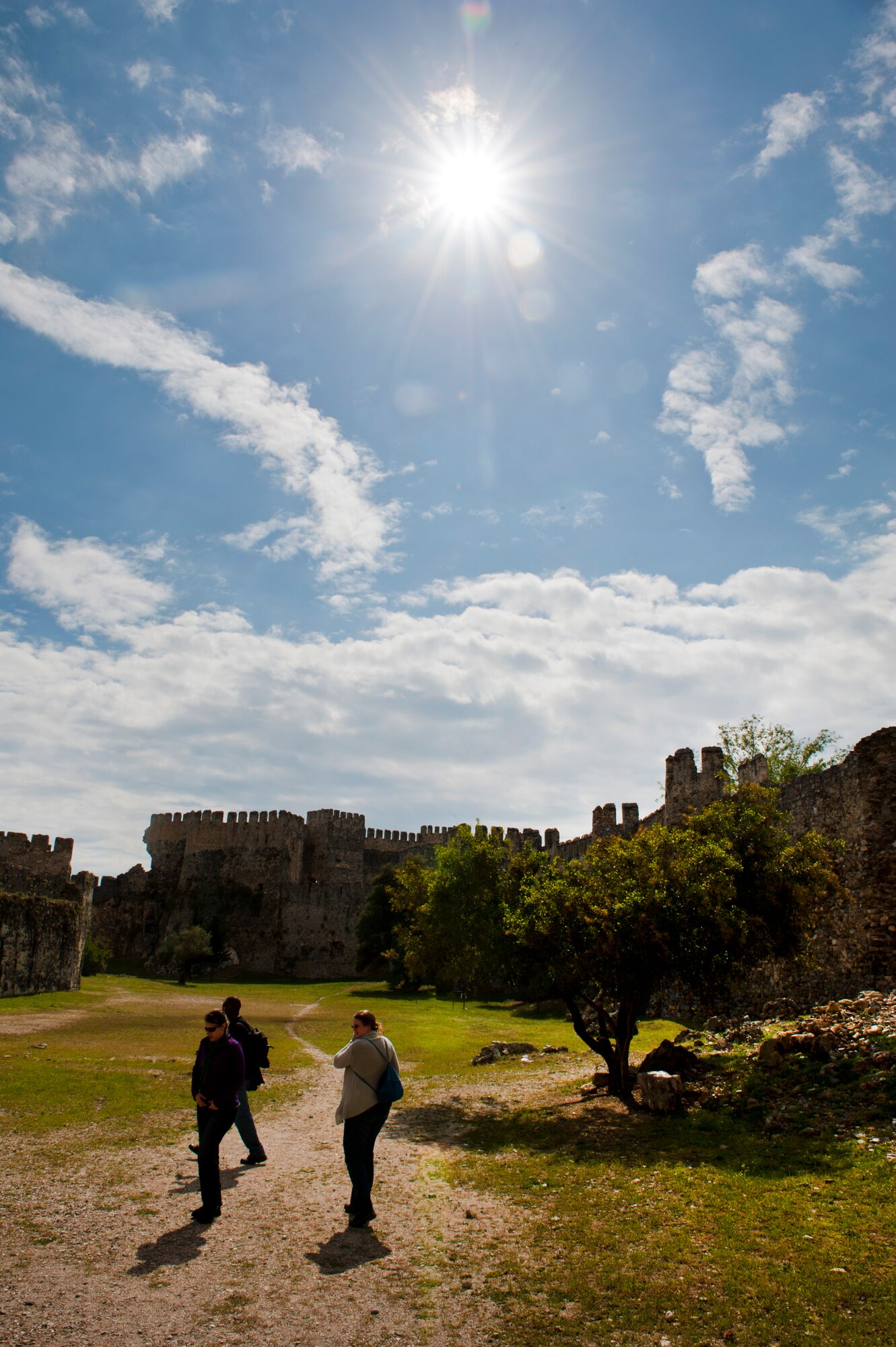 Walter Dedrick, 39th Logistics Readiness Squadron, his wife Leigh, 39th Force Support Squadron, and Capt. Heather Kershner, 39th Medical Operations Squadron, explore Mamure Castle April 20, 2013, at Anamur, Turkey. Mamure was built on the foundations of a fourth-century Roman castle. (U.S. Air Force photo by Senior Airman Daniel Phelps/Released)