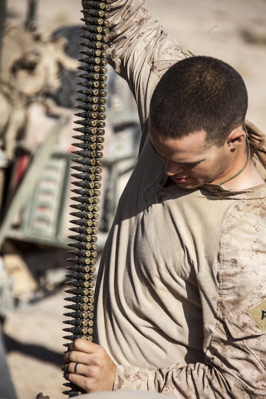 Lance Cpl. Zachary Davenport with the combined anti-armor team assigned to the 26th Marine Expeditionary Unit (MEU) prepare 7.62mm ammunition before firing them from M240B medium machine guns during an exercise in the 5th Fleet area of responsibility April 27, 2013. The 26th MEU is currently deployed as part of the Kearsarge Amphibious Ready Group to the 5th Fleet area of responsibility. The 26th MEU operates continuously across the globe, providing the president and unified combatant commanders with a forward-deployed, sea-based quick reaction force. The MEU is a Marine Air-Ground Task Force capable of conducting amphibious operations, crisis response, and limited contingency operations.
(U.S. Marine Corps photo by Staff Sgt. Edward Guevara/Released)
