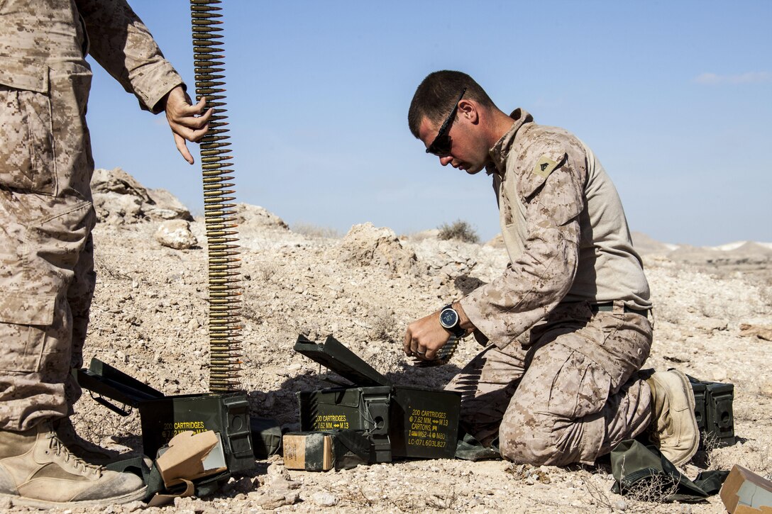 Cpl. Blake Bearb, section leader with the combined anti-armor team assigned to the 26th Marine Expeditionary Unit (MEU) prepare 7.62mm ammunition before firing them from M240B medium machine guns during an exercise in the 5th Fleet area of responsibility April 27, 2013. The 26th MEU is currently deployed as part of the Kearsarge Amphibious Ready Group to the 5th Fleet area of responsibility. The 26th MEU operates continuously across the globe, providing the president and unified combatant commanders with a forward-deployed, sea-based quick reaction force. The MEU is a Marine Air-Ground Task Force capable of conducting amphibious operations, crisis response, and limited contingency operations.
(U.S. Marine Corps photo by Staff Sgt. Edward Guevara/Released)