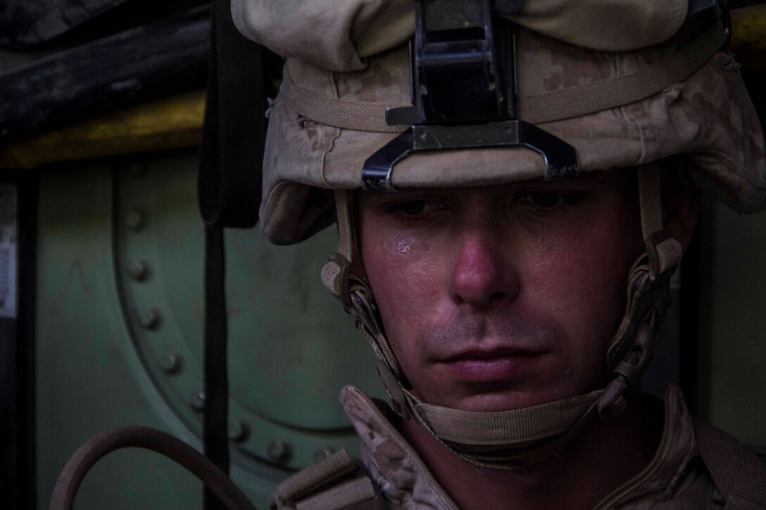 Lance Cpl. Michael Miller, automatic rifleman from Harrisburg, Penn., assigned to Company K, Battalion Landing Team 3/2, 26th Marine Expeditionary Unit (MEU), sits down in an amphibious assault vehicle during the extraction from a mechanized raid during an exercise in the 5th Fleet area of responsibility April 29, 2013. The 26th MEU is currently deployed as part of the Kearsarge Amphibious Ready Group to the 5th Fleet area of responsibility. The 26th MEU operates continuously across the globe, providing the president and unified combatant commanders with a forward-deployed, sea-based quick reaction force. The MEU is a Marine Air-Ground Task Force capable of conducting amphibious operations, crisis response, and limited contingency operations.
(U.S. Marine Corps photo by Cpl. Michael S. Lockett/Released)
