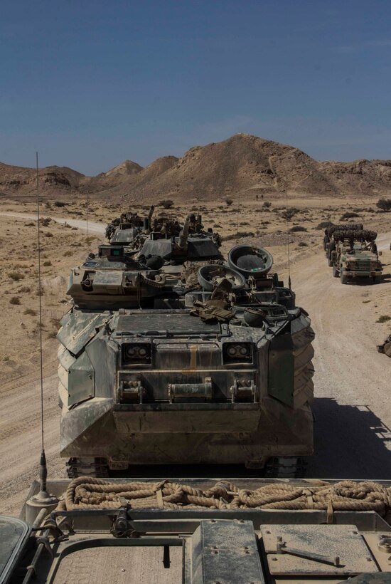Marines with Company K, Battalion Landing Team 3/2, 26th Marine Expeditionary Unit (MEU), take part in a mechanized raid with soldiers from the Royal Army of Oman during Exercise Sea Soldier 2013 in Rabkut, Oman, April 29, 2013. The 26th MEU is currently deployed as part of the Kearsarge Amphibious Ready Group to the 5th Fleet area of responsibility. The 26th MEU operates continuously across the globe, providing the president and unified combatant commanders with a forward-deployed, sea-based quick reaction force. The MEU is a Marine Air-Ground Task Force capable of conducting amphibious operations, crisis response, and limited contingency operations.
(U.S. Marine Corps photo by Cpl. Michael S. Lockett/Released)
