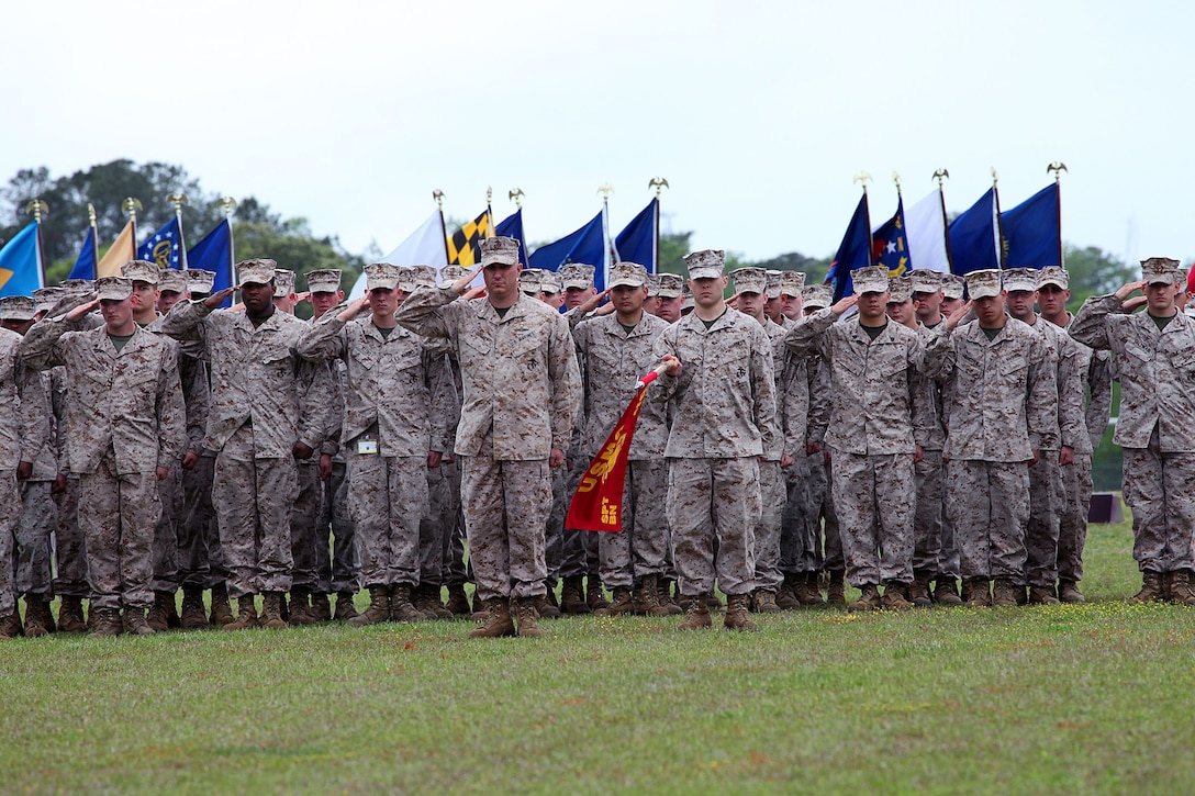 Col. Archibald M. McLellan, and Col. Jeffrey W. Fultz congratulate each other during the Change of Command ceremony at Stone Bay aboard Camp Lejeune. Fultz relinquished command to McLellan on May 2nd.