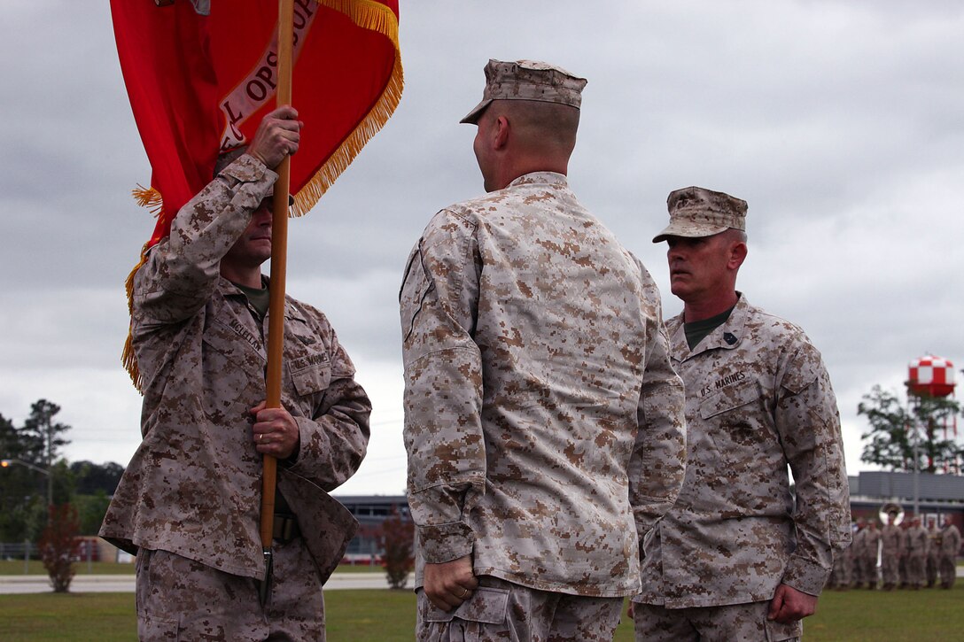 Col. Archibald M. McLellan, and Col. Jeffrey W. Fultz congratulate each other during the Change of Command ceremony at Stone Bay aboard Camp Lejeune. Fultz relinquished command to McLellan on May 2nd.