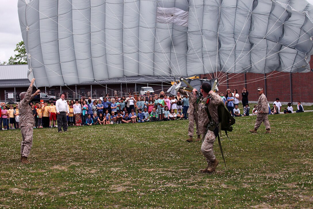 Approximately five classes totaling 120 students from the 4th Grade class from Bitz Intermediate School visited the U.S. Marine Corps Forces, Special Operations Command Paraloft. "It’s good for them, we put things into perspective for the kids and they learn how parachutes work," said Sgt. Patrick Ward, 27, Marine Special Operations Regiment, parachute rigger, from Rockford, Mich. The Marines displayed the numerous types of equipment and the different parachutes they use. 
