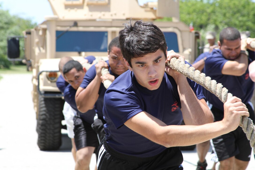 Poolees pull a High Mobility Multipurpose Wheeled Vehicle during the annual Sergeant Major's Cup held at Jones Beach in Wantagh, N.Y., June 16, 2012. The event is aimed toward motivating the poolees as they wait to ship to recruit training and introducing them to the camaraderie and esprit de Corps that comes along with being a Marine.