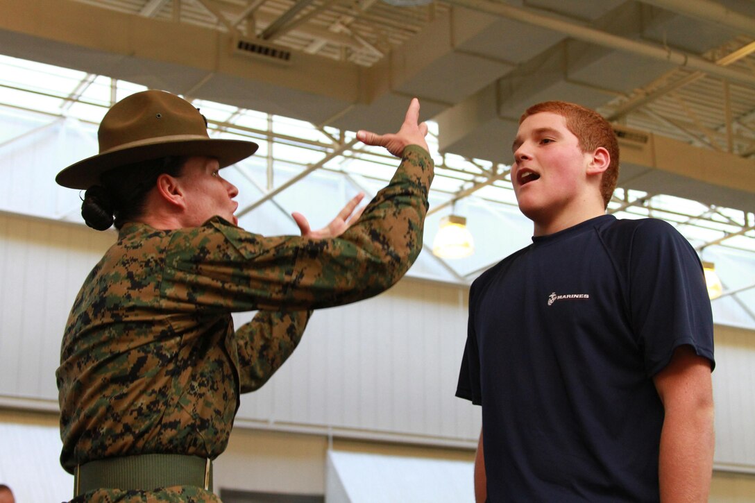 Sgt. Chasitie Chambers, a November Company drill instructor at Marine Corps Recruit Depot Parris Island, S.C., barks orders at a poolee during a pool function held at Floyd Bennett Field in Brooklyn, N.Y., Nov. 17, 2012. Drill instructors are brought out to interact with Recruiting Station New York poolees periodically to help prepare them for what recruit training will be like. Poolees spend a lot of time with their recruiters preparing physically, but they also need to prepare mentally.