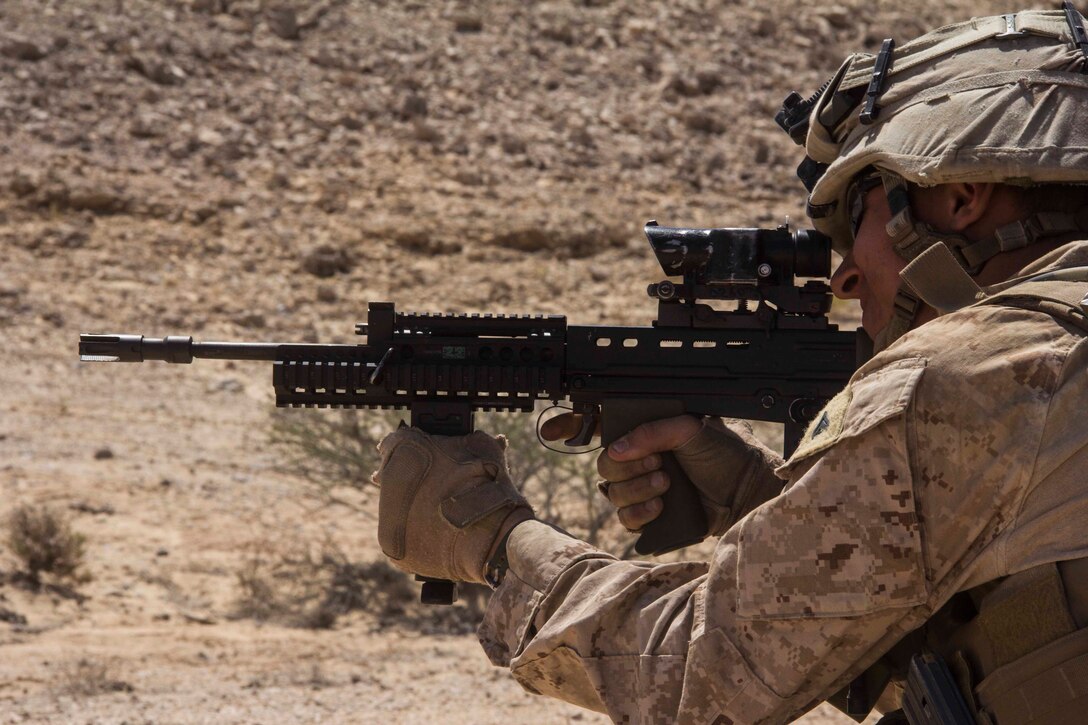 Cpl. Jesse Palmeiri, team leader from West Bridgewater, Mass., assigned to Company K, Battalion Landing Team 3/2, 26th Marine Expeditionary Unit (MEU), fires an SA-80 service rifle during a familiarization fire with foreign weapons systems as part of an exercise in the 5th Fleet area of responsibility May 1, 2013. The 26th MEU is currently deployed as part of the Kearsarge Amphibious Ready Group to the 5th Fleet area of responsibility. The 26th MEU operates continuously across the globe, providing the president and unified combatant commanders with a forward-deployed, sea-based quick reaction force. The MEU is a Marine Air-Ground Task Force capable of conducting amphibious operations, crisis response, and limited contingency operations.
(U.S. Marine Corps photo by Cpl. Michael S. Lockett/Released)
