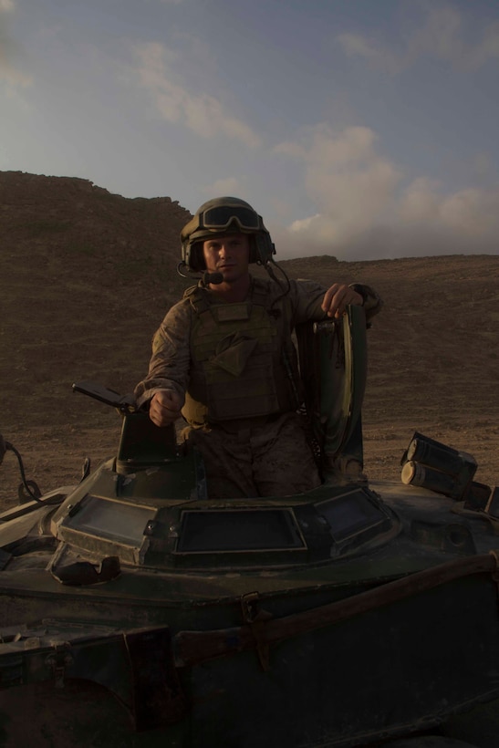 Cpl. Phillip Hollins, amphibious assault vehicle (AAV) commander from Gallatin, Tenn., assigned to AAV Platoon, Company K, Battalion Landing Team 3/2, 26th Marine Expeditionary Unit (MEU), guides his vehicle during their return to the USS Carter Hall (LSD 50) at the conclusion of a training exercise in the 5th Fleet area of responsibility May 4, 2013. The 26th MEU is currently deployed as part of the Kearsarge Amphibious Ready Group to the 5th Fleet area of responsibility. The 26th MEU operates continuously across the globe, providing the president and unified combatant commanders with a forward-deployed, sea-based quick reaction force. The MEU is a Marine Air-Ground Task Force capable of conducting amphibious operations, crisis response, and limited contingency operations.
(U.S. Marine Corps photo by Cpl. Michael S. Lockett/Released)

