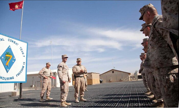 U.S. Marine Corps Col. Austin E. Renforth, commanding officer, Regimental Combat Team 7 addresses fellow Marines and Sailors on Camp Leatherneck, Helmand province, Afghanistan, May 1, 2013.