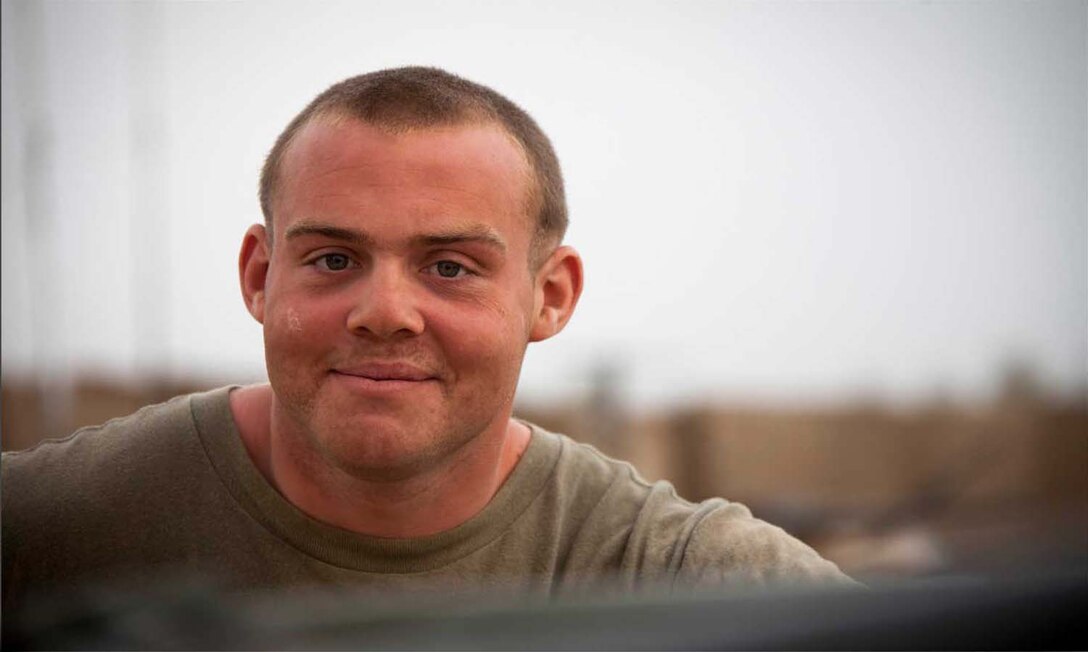 U.S. Marine Corps Lance Cpl. Christopher Melin, a loader with Delta Company, 1st Tank Battalion, Regimental Combat Team 7, pauses from conducting function checks on an M1A1 Abrams tank on forward operating base Shir Ghazay, Helmand province, Afghanistan, April 25, 2013.
