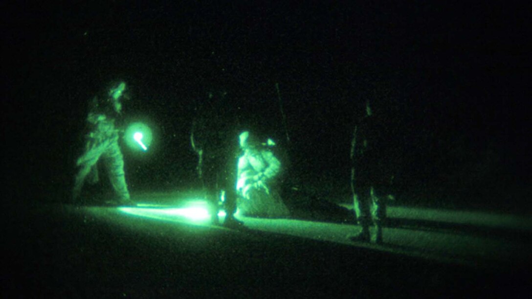 May 9, 2013: Marines with Maritime Raid Force, 13th Marine Expeditionary Unit, capture a mock high value individual at a blocking position as part of an exercise at Saint George, Utah, during Ground Realistic Urban Training.