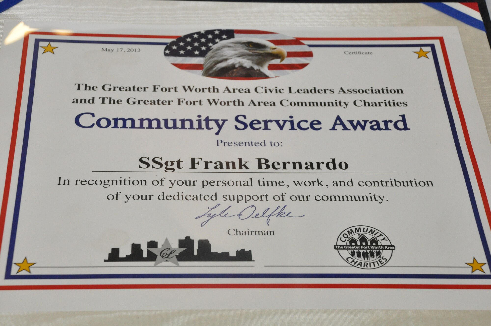 Tech Sgt. Frank Bernardo, 457th Fighter Squadron, was presented with a certificate for his selfless community service to the Wounded Warrior program over the past year on Friday, May 17, at the Fort Worth Civic Leader Association Community Luncheon and barbeque held at the Naval Air Station Fort Worth Joint Reserve Base, Texas. Sgt. Bernardo's brother was severely wounded last year and he has spent many countless hours to helping to improve his quality of life. (Official Air Force photo/Master Sgt. Julie Briden-Garcia)