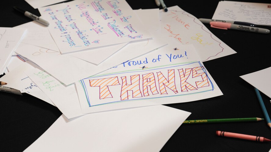 A pile of letters waits to be packed up to be sent to troops currently deployed overseas at the Red Lion ballroom in Spokane, Wash., May 15, 2013. Over 200 boxes of supplies and letters were boxed up and donated to troops. (U.S. Air Force photo by Senior Airman Samantha Krolikowski/Released)