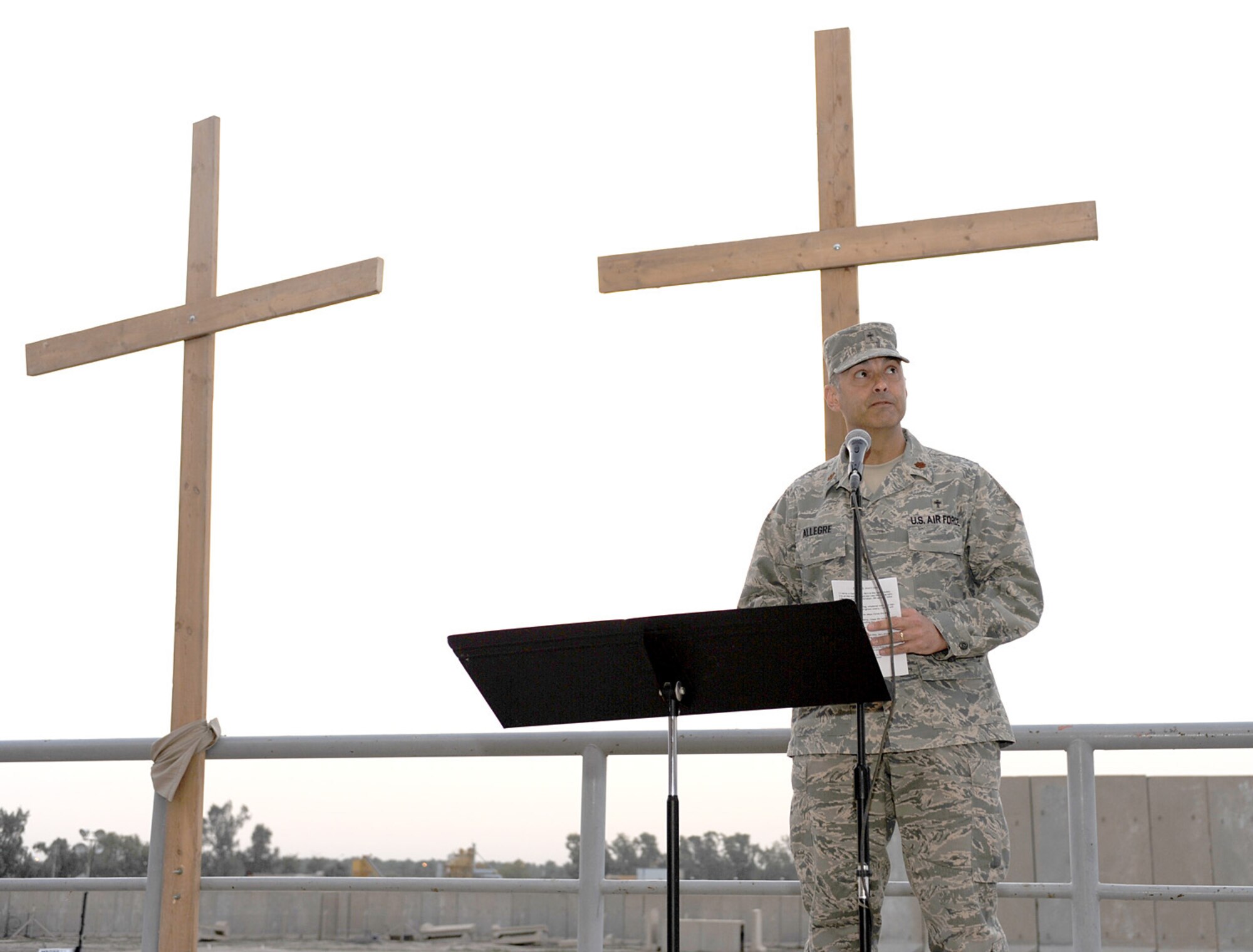 Chaplain (Maj.) Pierre Allegre, 446th Airlift Wing chaplain, conducts a worship service in Southwest Asia in 2010.  Allegre and the entire 446th Airlift Wing Chapel staff earned the Air Force Reserve Command Outstanding Chaplain Corps Program Award for 2012. (Courtesy photo)