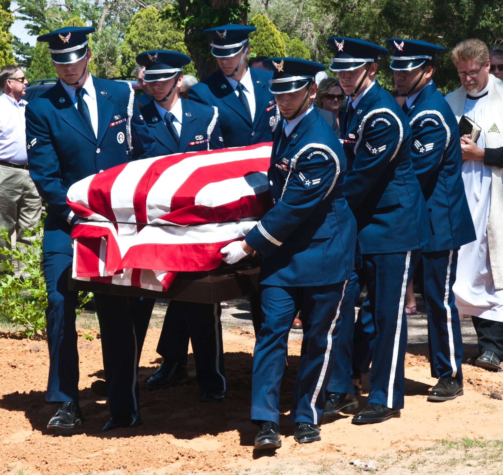 Members of Honor Guard at Cannon Air Force Base, N.M., serve as pallbearers during a funeral for Johnny D. Morgan, a combat medic who received a Bronze Star for his service during World War II, in Portales, N.M., May 16th, 2013. Morgan was the last remaining veteran of the original 14 Roosevelt County soldiers in the 804th Tanker Destroyer Battalion.

