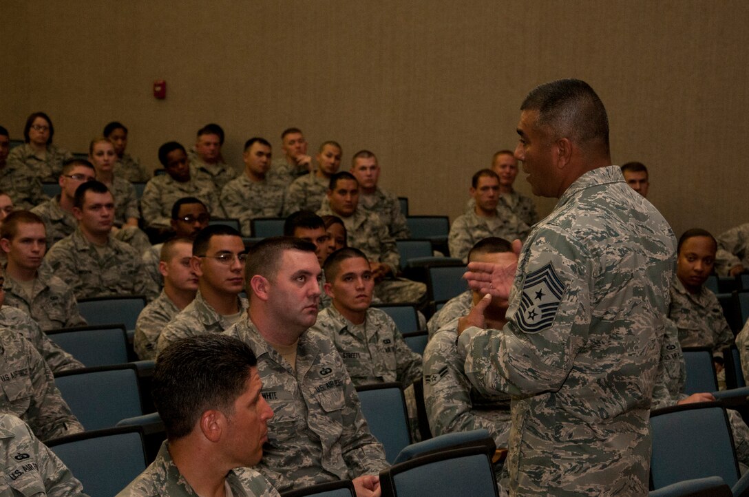 Chief Master Sgt. Gerardo Tapia, Air Education and Training Command command chief, speaks at an Enlisted All Call at Laughlin Air Force Base, Texas, May 16, 2013. Tapia visited several base facilities and addressed concerns affecting the Air Force and AETC. (U.S. Air Force photo/Airman 1st Class John D. Partlow)