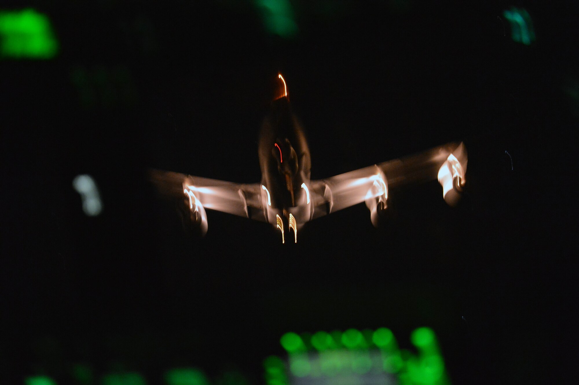 A C-17 Globemaster III from Joint Base Lewis-McChord, Wash., approaches a KC-135 Stratotanker for midair refueling during a training mission May 14, 2013. Pilots practiced maintaining flight controls while the KC-135 boom operator attempts to attached refueling boom. Pilots were able to meet essential training requirements for performing nighttime midair refueling to maintain their certifications. (U.S. Air Force photo/Airman 1st Class Jacob Jimenez)