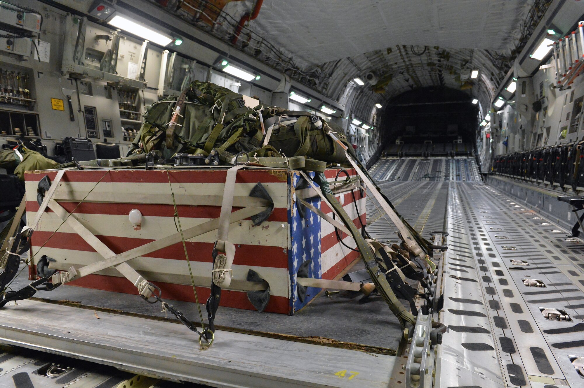 A simulated container delivery system bundle is packed and ready to be dropped from a C-17 Globemaster III during a training mission May 14, 2013 at Joint Base Lewis-McChord, Wash. Each airdrop is carefully calculated to ensure cargo lands in the designated drop zone. Loadmasters during the mission were able to meet their training requirements for heavy equipment rigging and airdrops. (U.S. Air Force photo/Airman 1st Class Jacob Jimenez)
