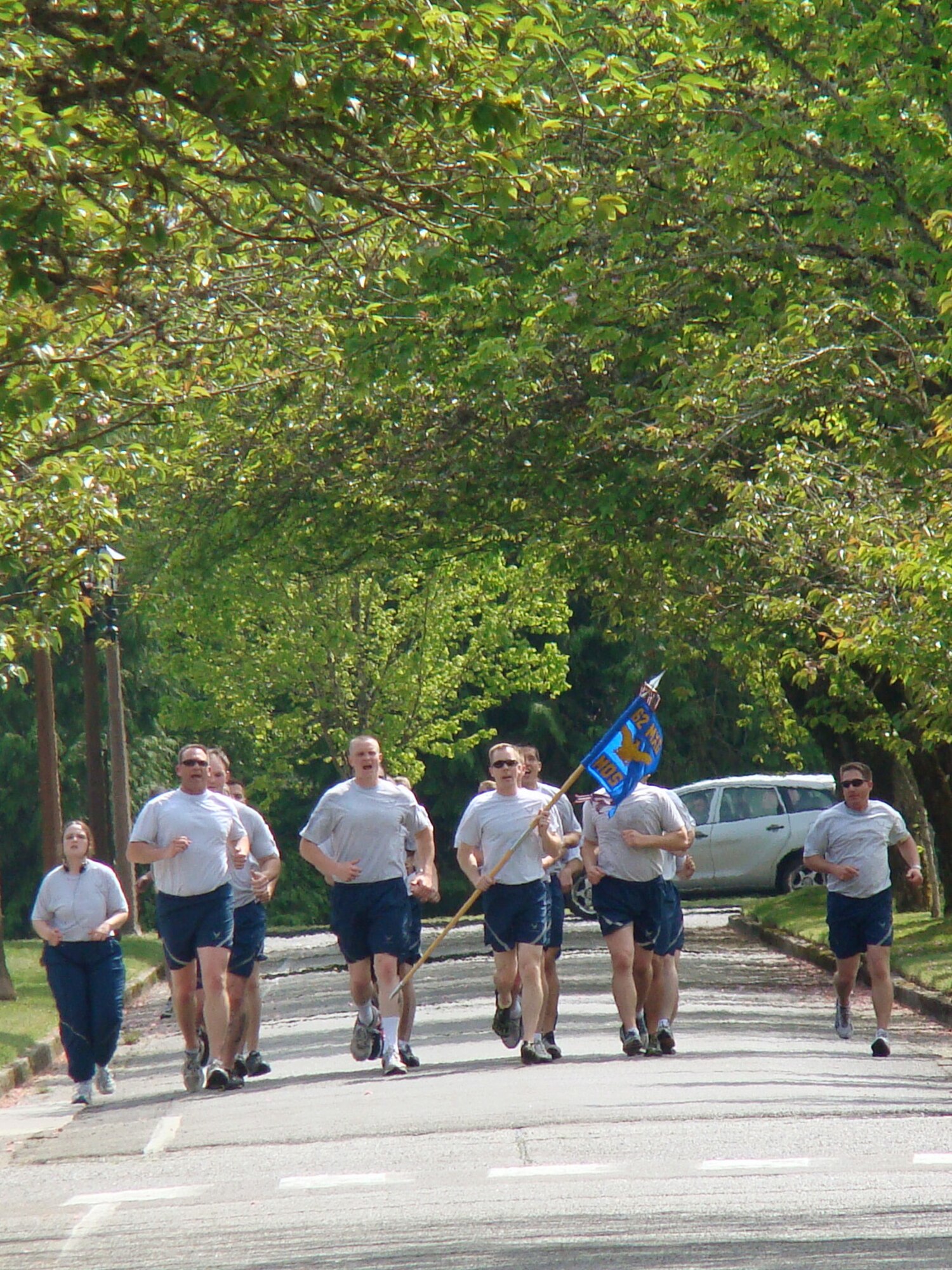 Members of the 62nd Maintenance Operations Squadron run in formation May 10, 2013 during Wingman Day at Joint Base Lewis-McChord, Wash. This was the squadron's last run together before its deactivation on May 13, 2013. (Courtesy photo)