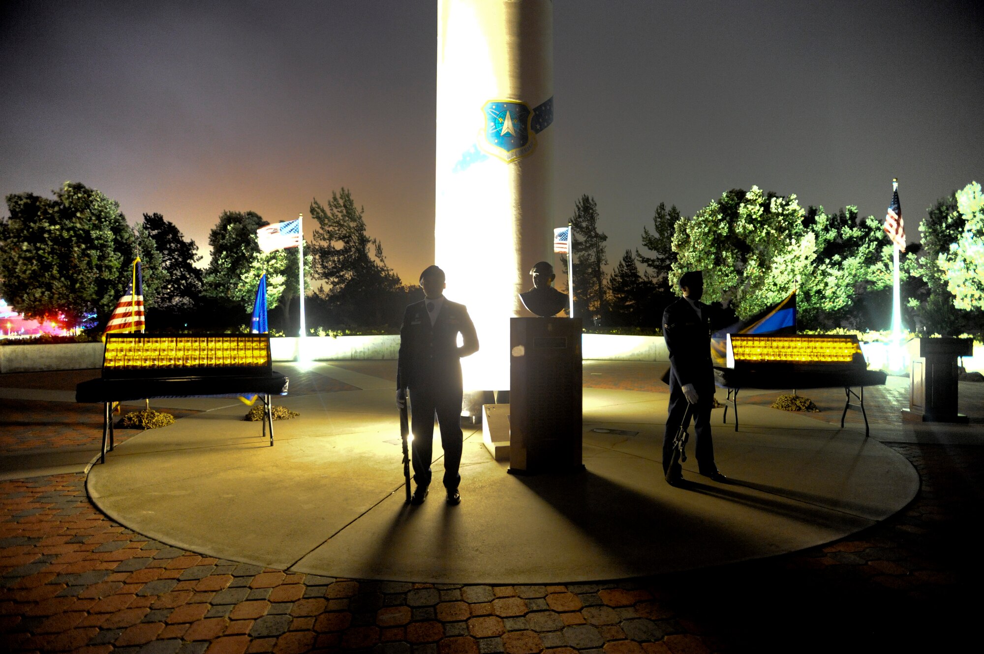 VANDENBERG AIR FORCE BASE, Calif. – Members of the 30th Security Forces Squadron, stand guard during the Candlelight Vigil Ceremony at Missile V here Thursday, May 16, 2013. The ceremony was held as part of Vandenberg’s National Police Week commemoration to honor law enforcement personnel who have fallen in the line of duty. (U.S. Air Force photo/Airman Yvonne Morales)