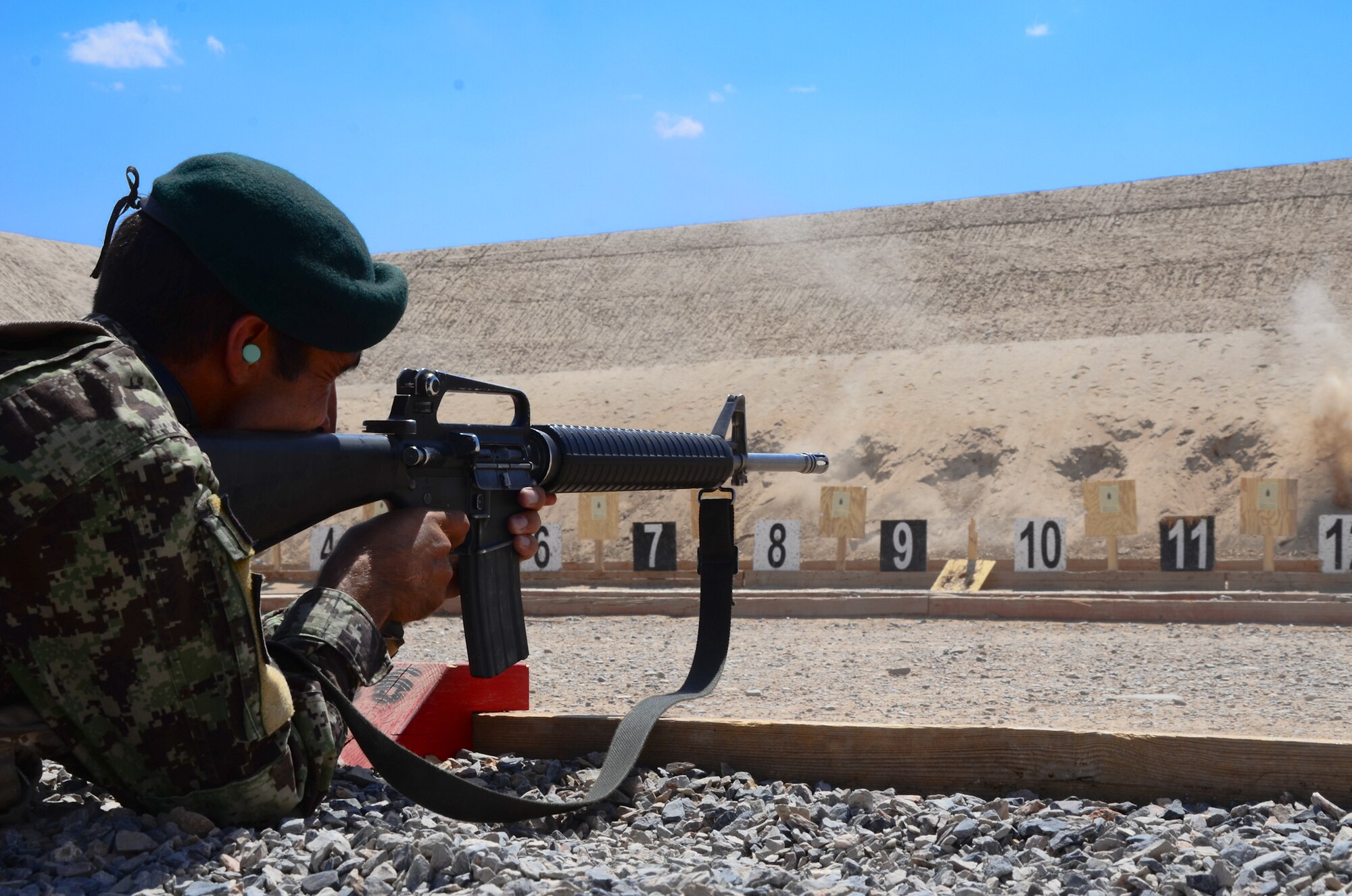 KANDAHAR, Afghanistan – An Afghan National Army soldier fires his M16A2 rifle at a practice target during a live-fire training exercise at a firing range on Kandahar Airfield May 6, 2013. The M16A2 rifle is the primary weapon employed by ANA and Afghan Air Force personnel. The 443rd Air Expeditionary Advisor Squadron security forces advisors train ANA and AAF security forces daily as Afghanistan assumes primary responsibility for security in the country. (U.S. Air Force photo/1st Lt Tony Richardson)