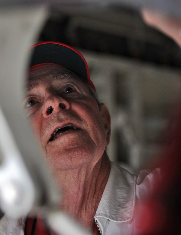 Charlie Brown, retired 13th Bomb Squadron member, analyzes the bomb bay of a B2 Spirit during a tour at Whiteman Air Force Base, May 10, 2013. The tour was part of a day of 13th BS heritage events packed with storytelling and walkthroughs of various areas on the flightline. Brown served in the Air Force since before the Korean War and dedicated more than 20 years as an enlisted pilot. (U.S. Air Force photo by Staff Sgt. Nick Wilson/Released)
