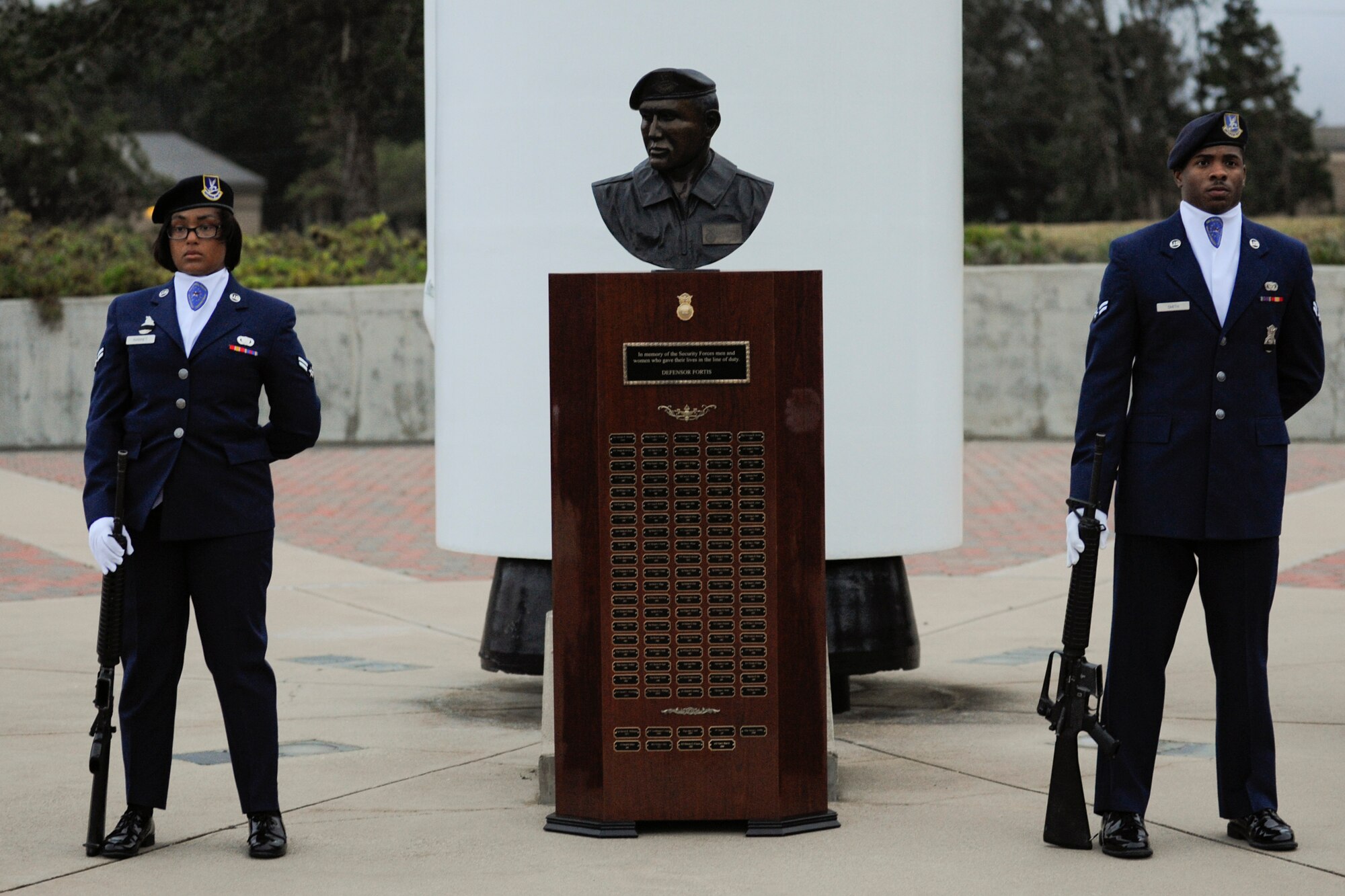 VANDENBERG AIR FORCE BASE, Calif. – Members of the 30th Security Forces Squadron stand guard during the Candlelight Vigil Ceremony at Missile V here Thursday, May 16, 2013. The ceremony was held as part of Vandenberg’s National Police Week commemoration to honor law enforcement personnel who have fallen in the line of duty. (U.S. Air Force photo/Airman Yvonne Morales) 