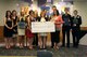 (Left to right)  Leigh Weidman, Sheppard Officers' Spouses Club president and Trish Berube, SOSC 2nd vice president, stand with scholarship recipients Abigail Skipworth, Lisa Prakash (mother of Sora Prakash), Cassiel Dillard, Megan Tideman, Jessica Byrd, Ashley Sissel, Zack McMurry, Marci Cantrell (mother of Brittany Walkingstick), Caleb Brumley and Robert Brumley III during the SOSC's Scholarship Dinner May 11, 2013. The SOSC awarded 11 recipients $37,000 for college scholarships during the dinner at the Sheppard Club. (U.S. Air Force courtesy photo)
