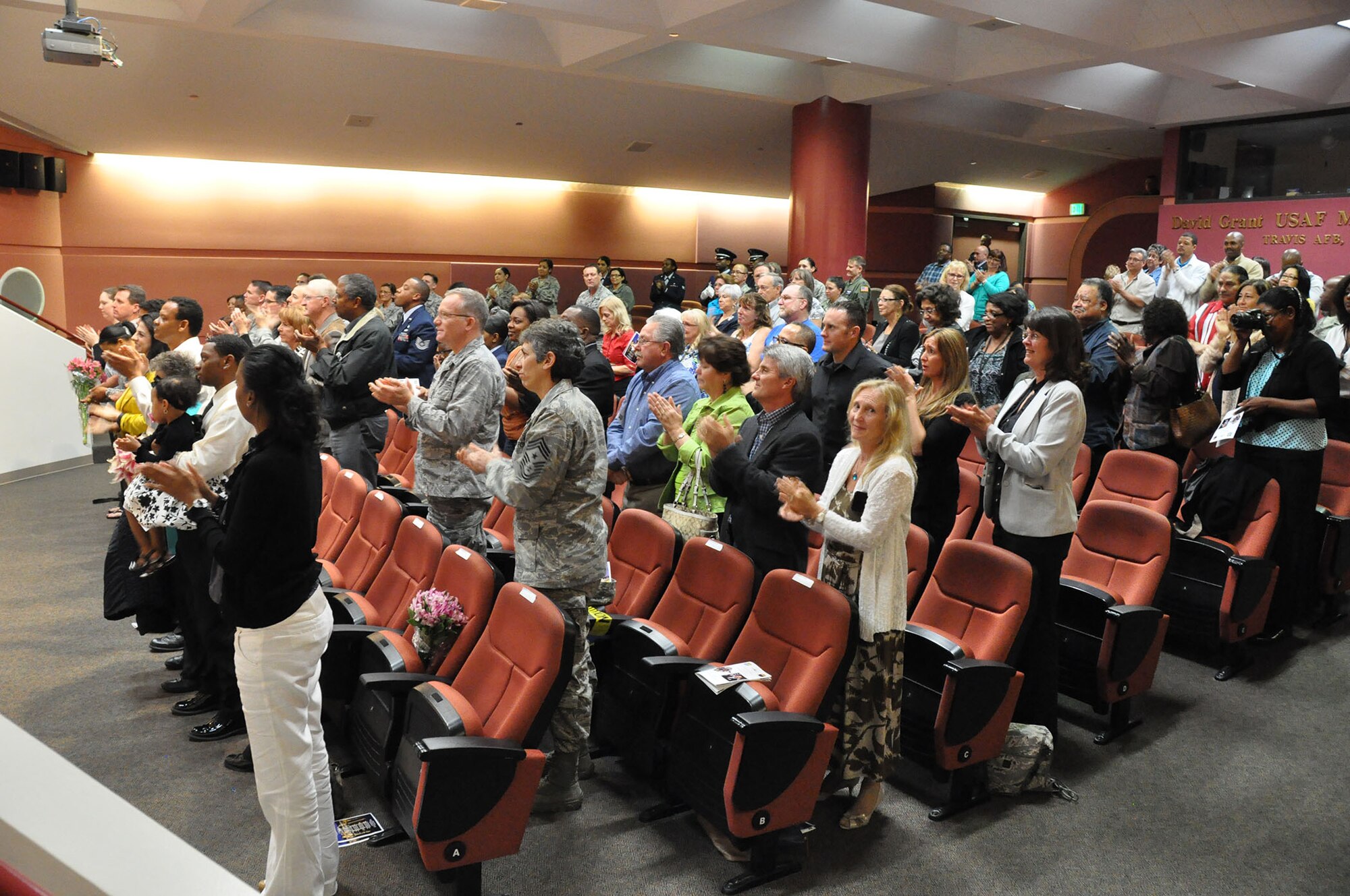 TRAVIS AIR FORCE BASE, Calif. -- After more than 33 years of faithful service to her country, Chief Master Sgt. Denise P. Butler, Superintendent, 349th Aerospace Medicine Squadron, celebrates her many years of service during a ceremony held in her honor at Travis Air Force Base, Calif. on April 7, 2013. (U.S. Air Force photo / Senior Airman Amelia Leonard) 