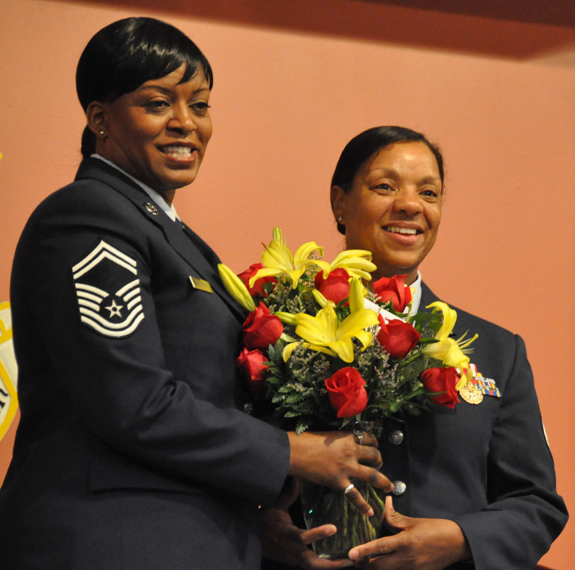TRAVIS AIR FORCE BASE, Calif. -- After more than 33 years of faithful service to her country, Chief Master Sgt. Denise P. Butler, Superintendent, 349th Aerospace Medicine Squadron, celebrates her many years of service during a ceremony held in her honor at Travis Air Force Base, Calif. on April 7, 2013. (U.S. Air Force photo / Senior Airman Amelia Leonard) 